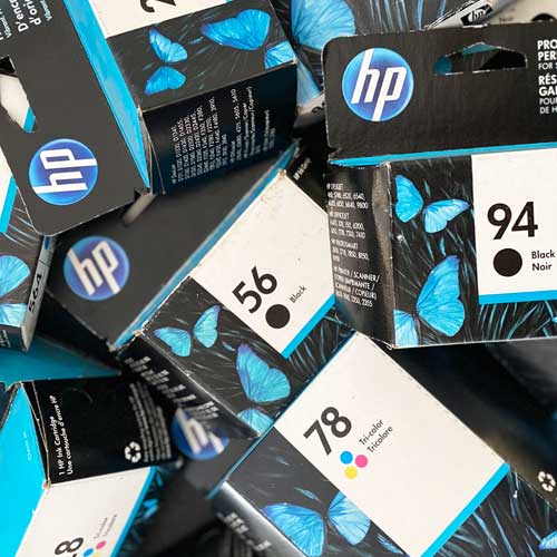 pile of ink cartridges for recycling